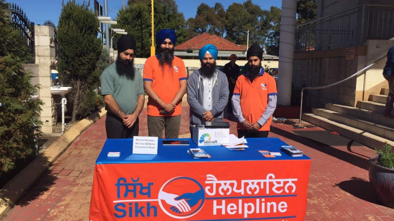 Volunteers of Sikh Helpline spreading awareness about their services