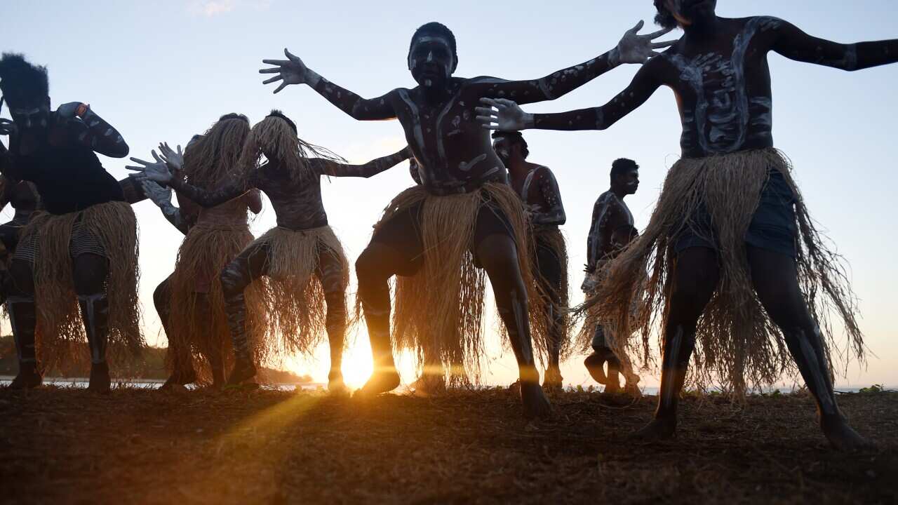 The Injinoo Dance Group rehearse before performing during a welcome to country ceremony for Australian Prime Minister Tony Abbott