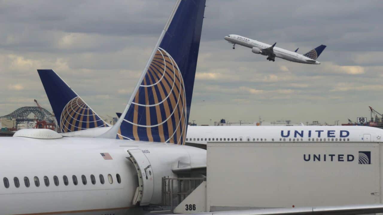 File: A United Airlines airplane takes off.
