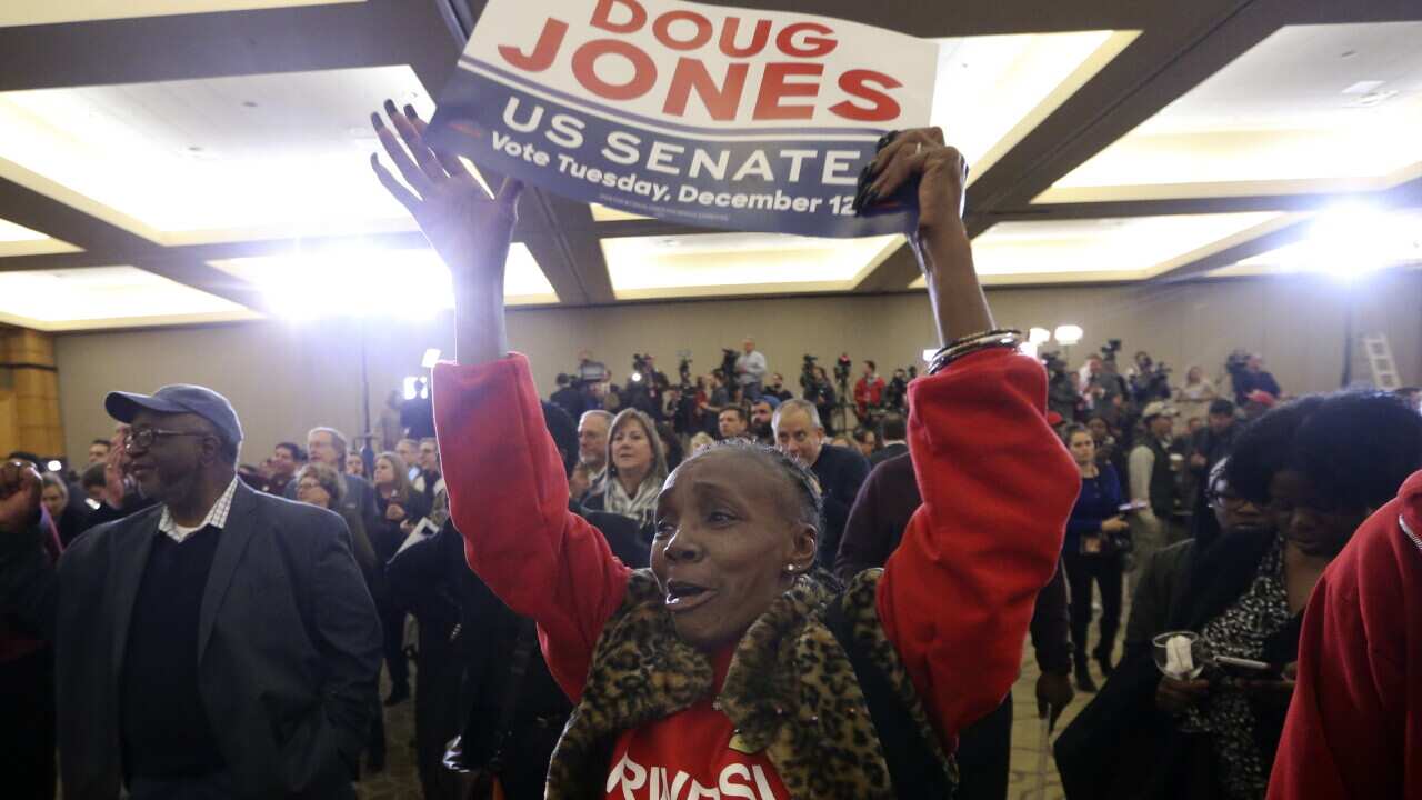 A Doug Jones supporter at an election night party in Alabama on 12 December 2017.