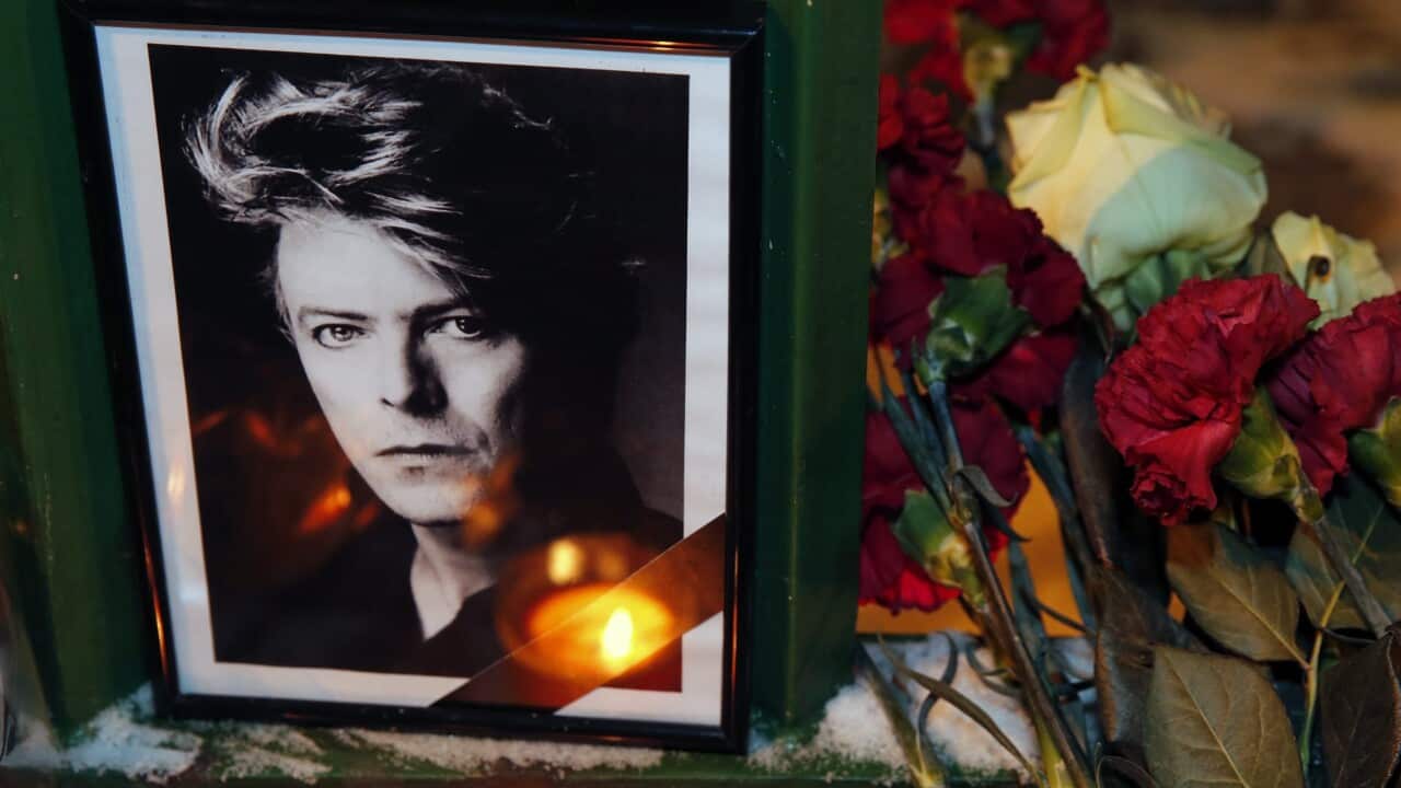 Flowers, candles and a portrait picture of late British musician David Bowie have been left by Russian fans in front of the British consulate in St. Petersburg, Russia, 11 January 2016. (EPA/ANATOLY MALTSEV)