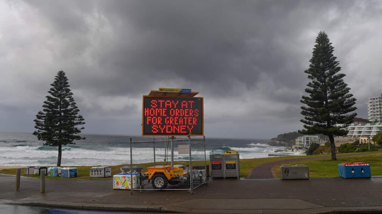 A Covid warning sign is seen at Bondi Beach in Sydney, Saturday, July 10, 2021. Tough new restrictions are now in place for Greater Sydney after another spike in COVID-19 cases. (AAP Image/Mick Tsikas) NO ARCHIVING
