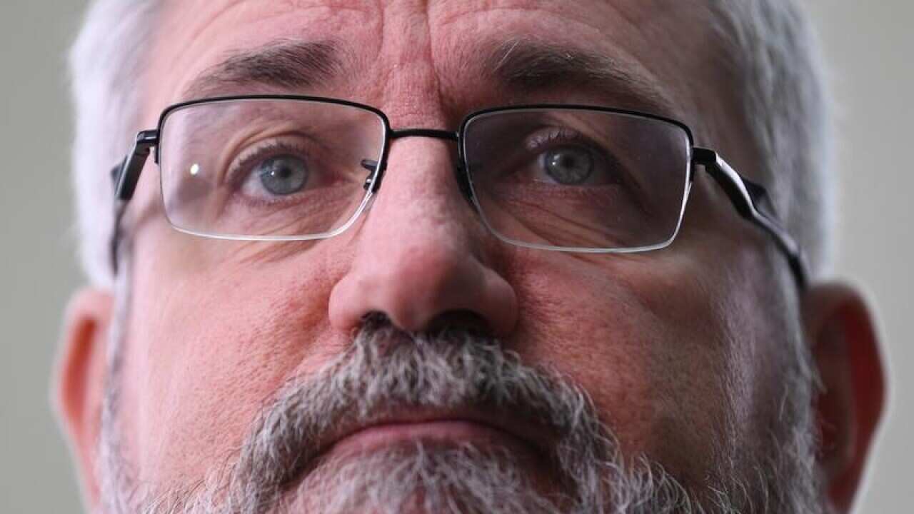 Greens Senator Andrew Bartlett speaks to the media in Canberra.