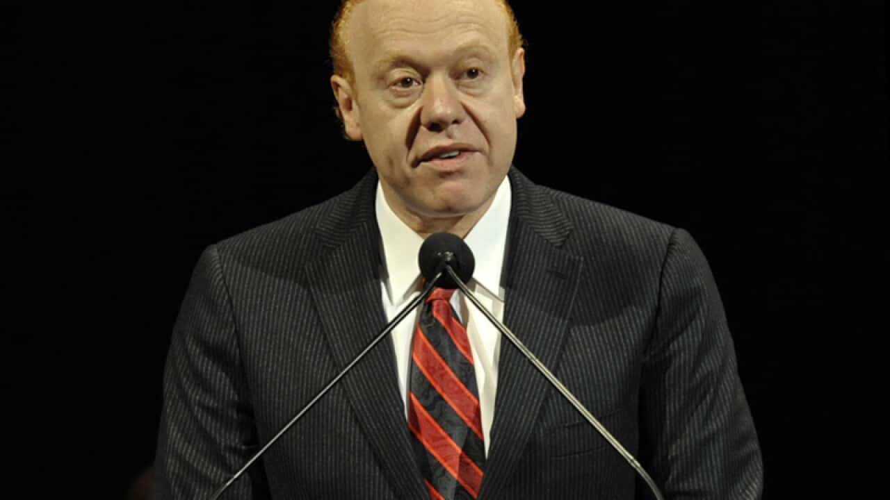 Anthony Pratt address an audience