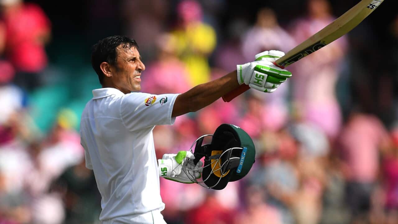 Younis Khan of Pakistan gestures to the crowd after scoring a century