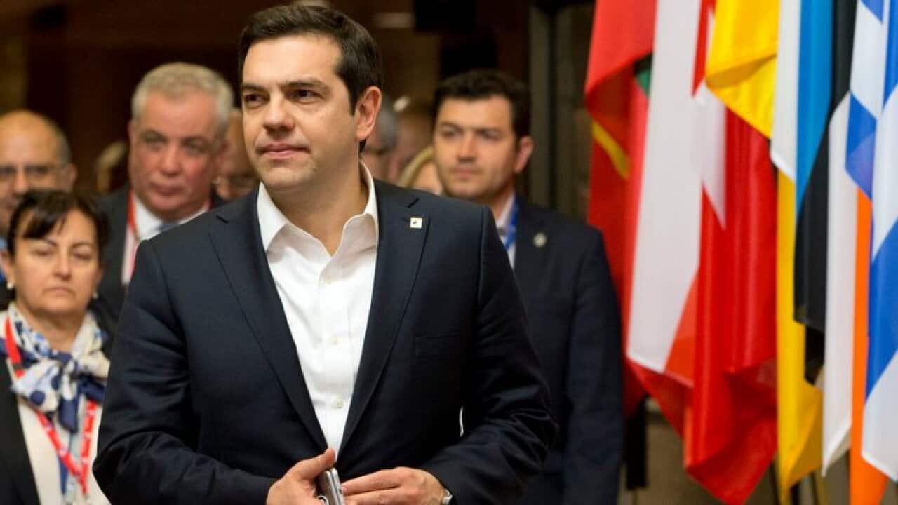 Greek Prime Minister Alexis Tsipras, leaves an EU summit in Brussels