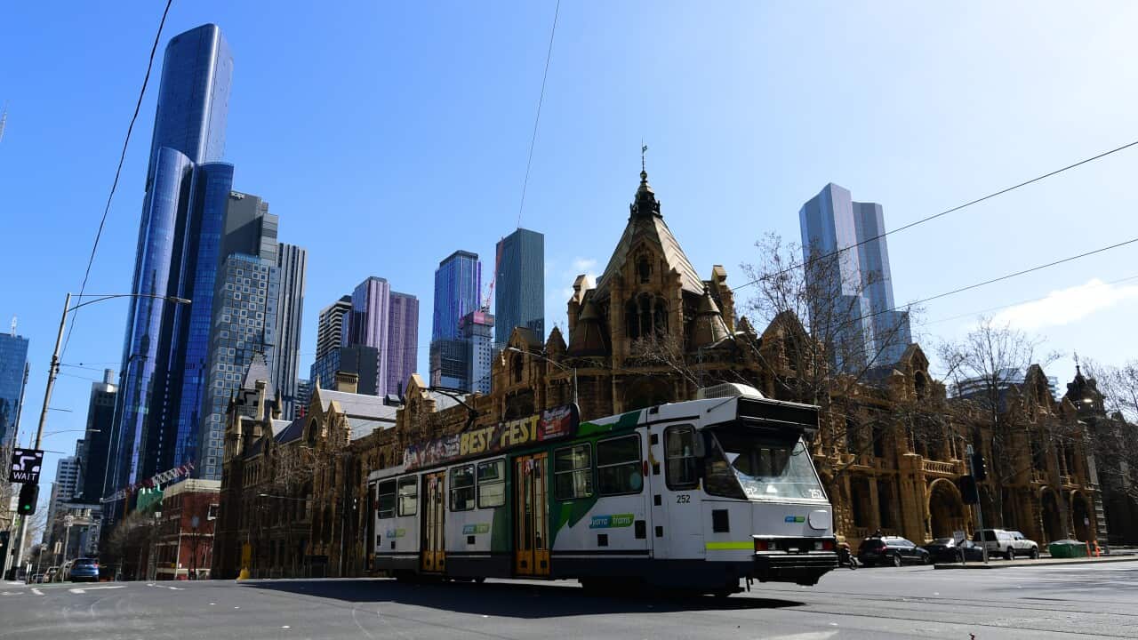 A tram is seen on La Trobe Street in Melbourne, Friday, August 28, 2020