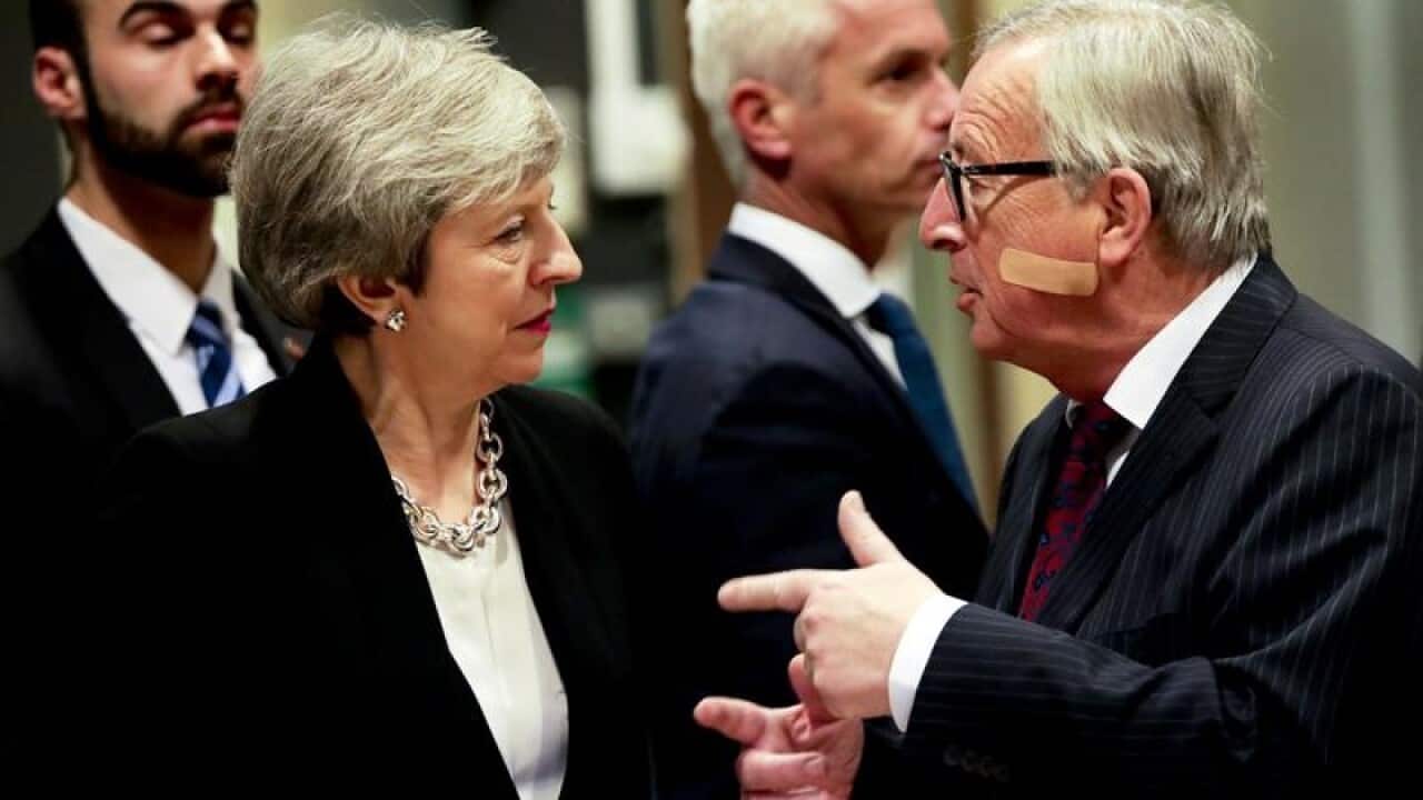 Theresa May and Jean-Claude Juncker