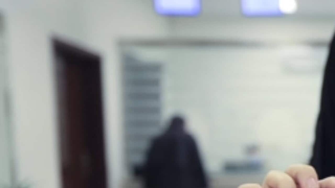 Tahani Aldosemani, Assistant Professor at Prince Sattam Bin Abdulaziz University in Al-Kharj, displays her brand new driving license.