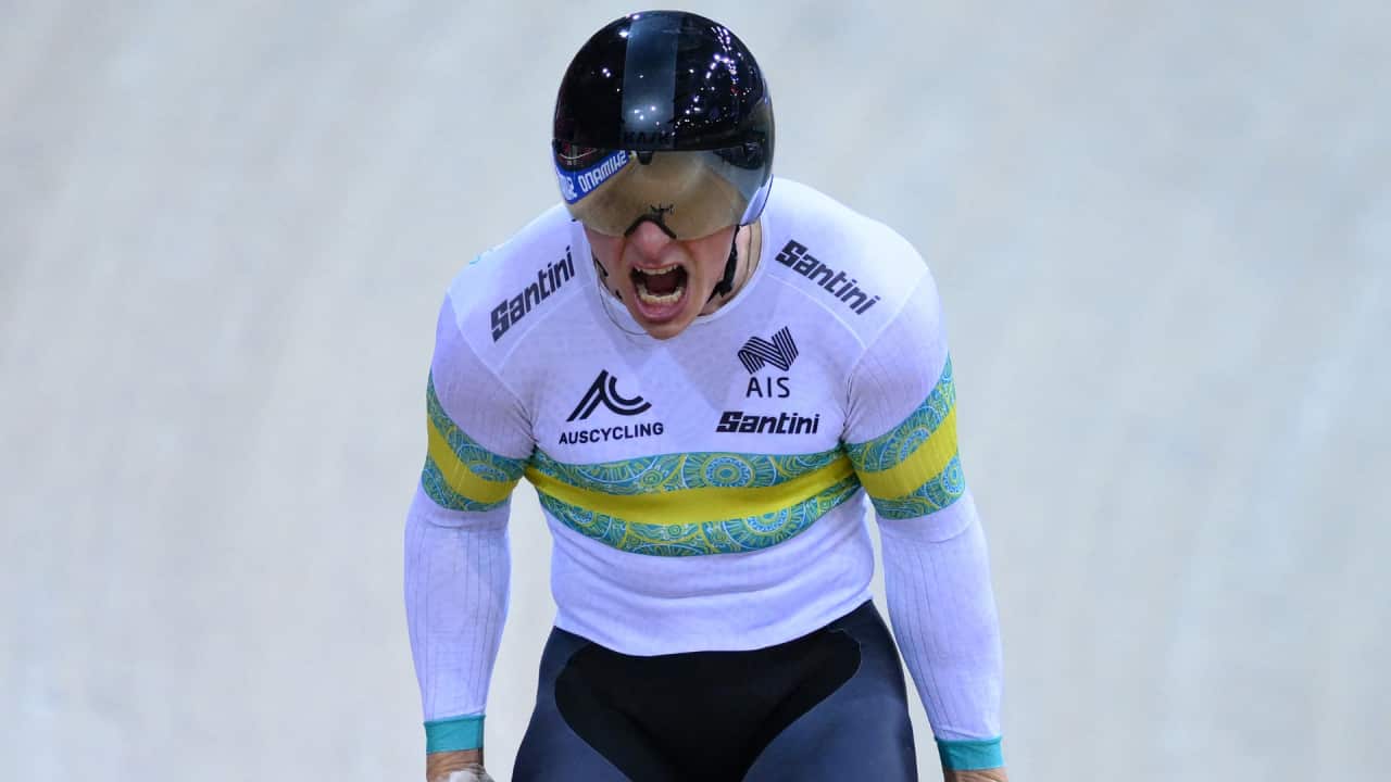 Australia's Matthew Richardson celebrates after winning the Men's Team Sprint at the 2022 UCI Track Cycling World Championships