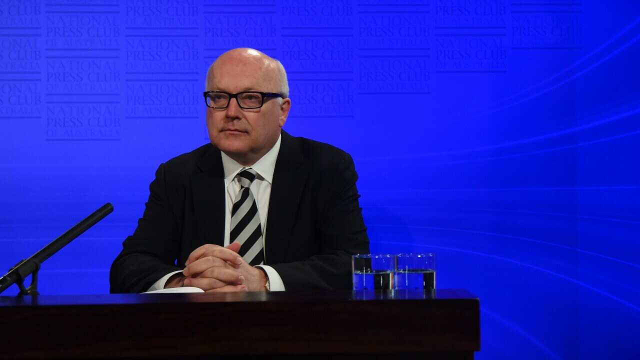 Attorney-General George Brandis addresses the National Press Club in Canberra, Wednesday, Oct. 1, 2014. (AAP Image/Lukas Coch) NO ARCHIVING