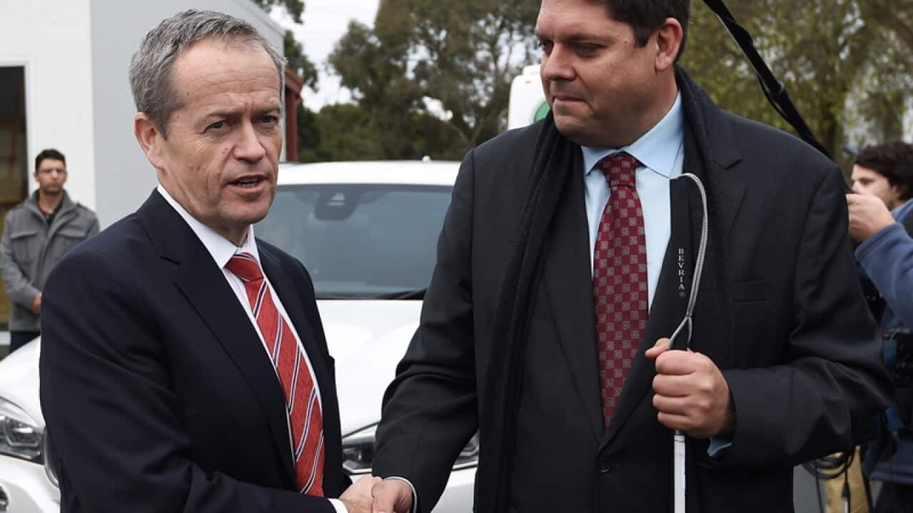 Opposition Leader Bill Shorten with Tony Clark (R)