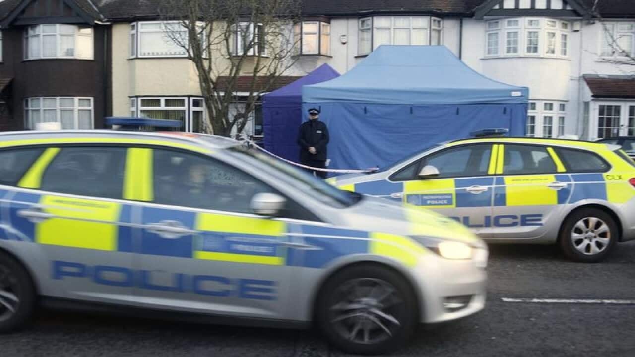 Police outside the home of Russian businessman Nikolai Glushkov.