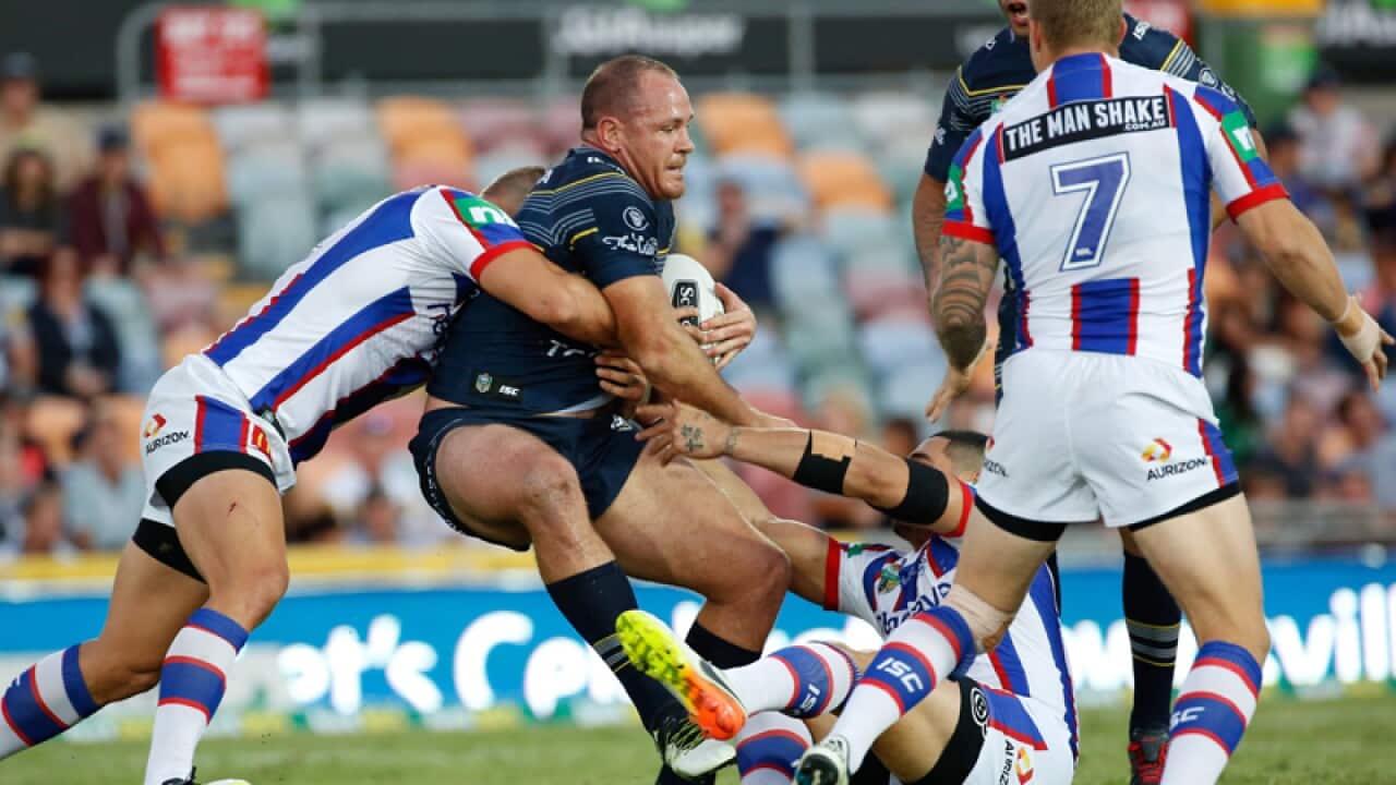 North Queensland's Matt Scott is tackled