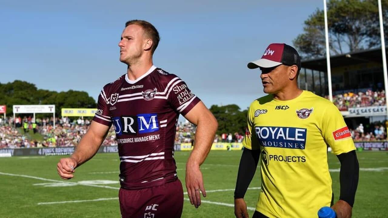 Daly Cherry-Evans hobbles of with an injury