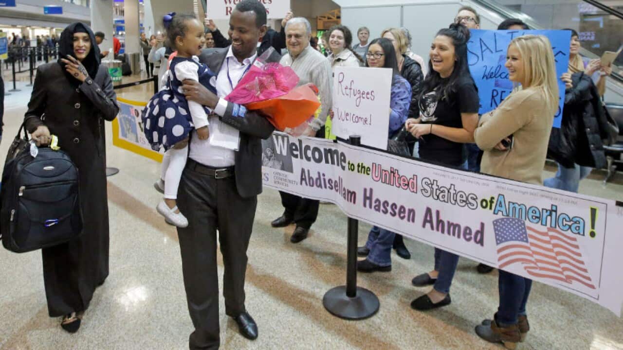 This Feb. 10, 2017, file photo, Abdisellam Hassen Ahmed, a Somali refugee who had been stuck in limbo after President Donald Trump temporarily banned refugees