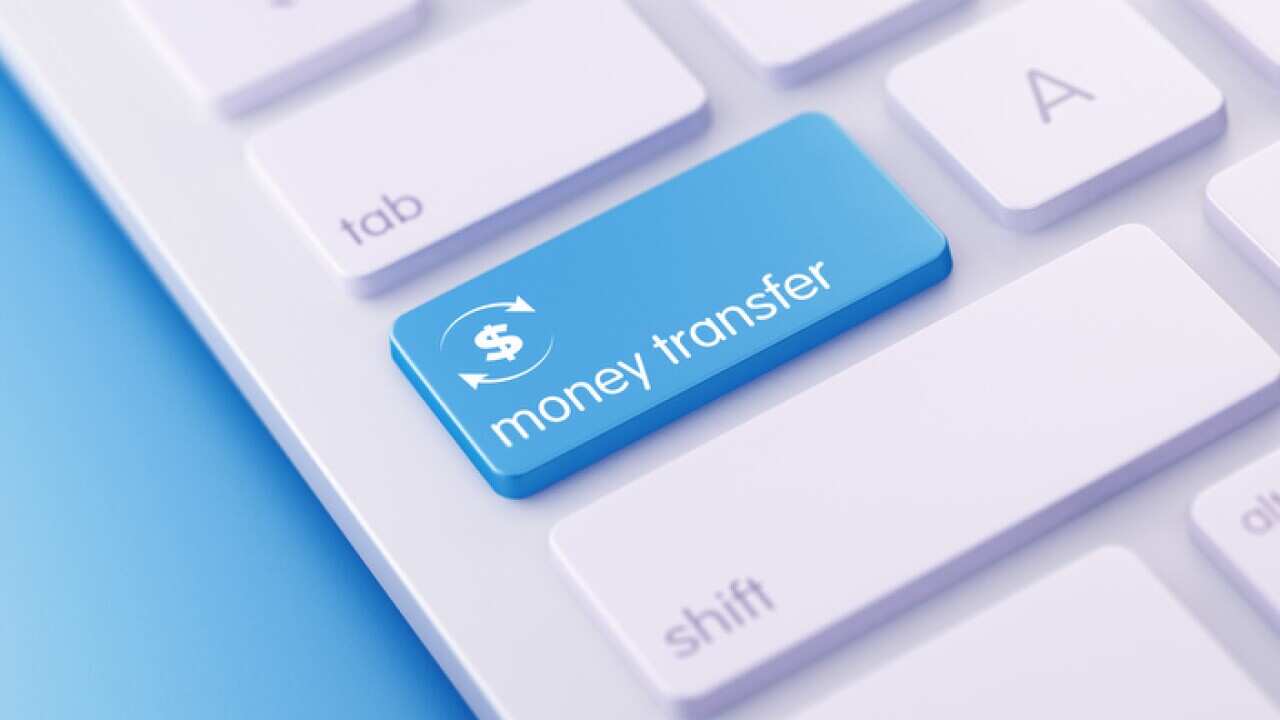 Modern Keyboard with Blue Money Transfer Button