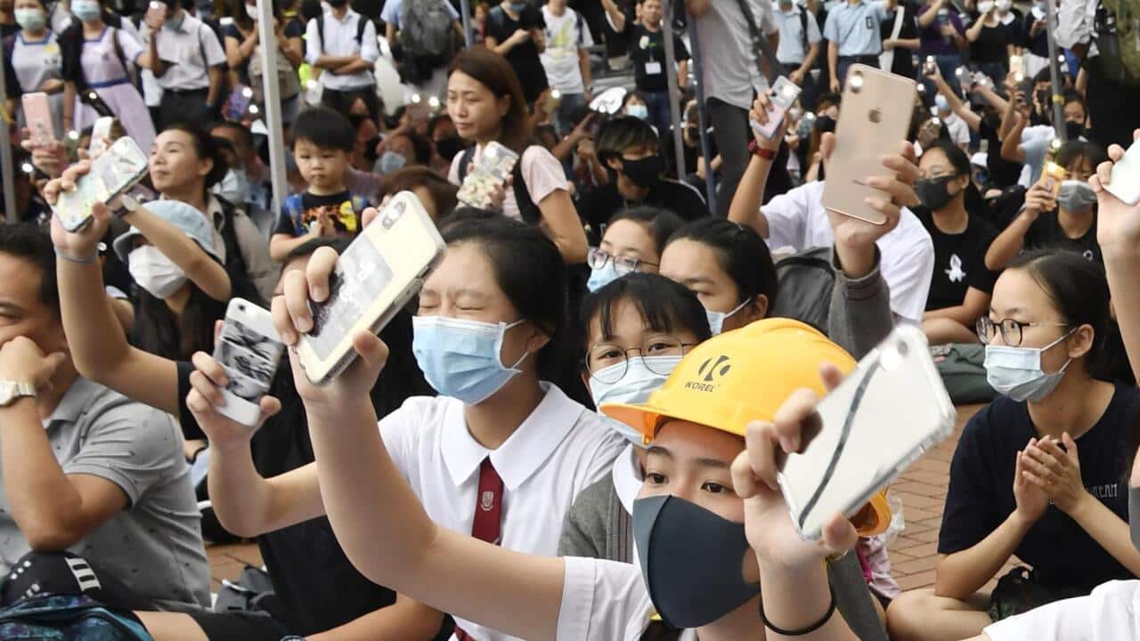 About 4,000 secondary school students boycott their classes and attend an anti-extradition bill protest at Edinburgh Place in central Hong Kong on Sept. 2, 2019, the first day of the new school year. (Kyodo via AP Images) ==Kyodo