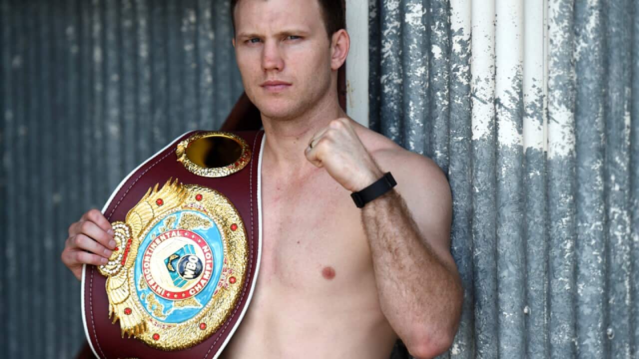 Welterweight boxer Jeff Horn poses for photos in Brisbane