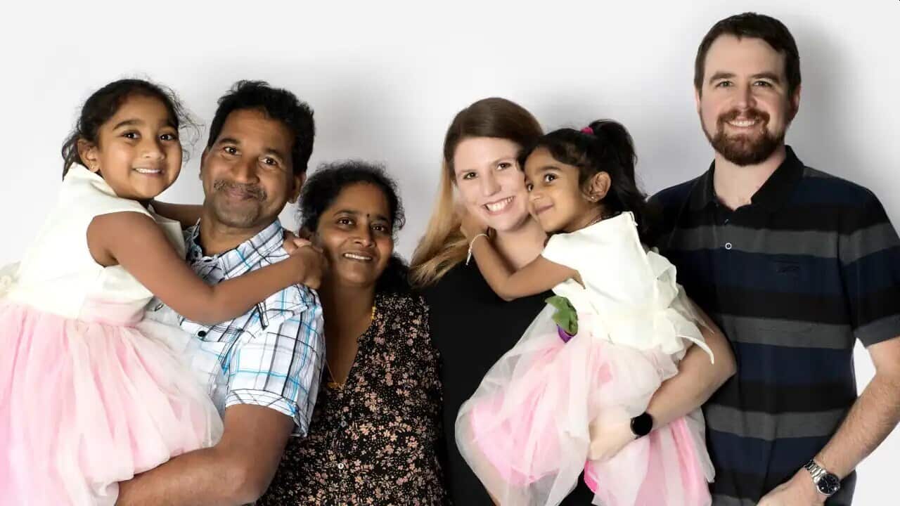 The Murugappan family with friend and advocate Angela Fredericks.