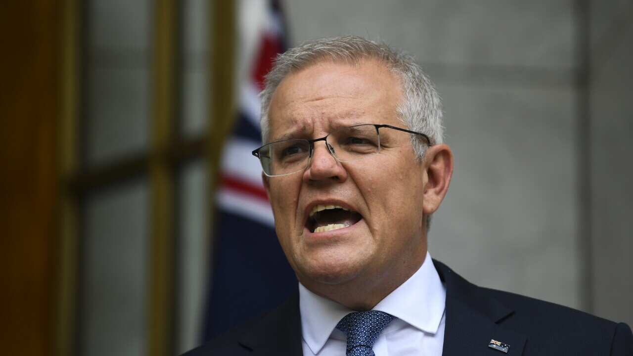 Australian Prime Minister Scott Morrison speaks to the media during a press conference at Parliament House in Canberra, Monday, November 22, 2021.
