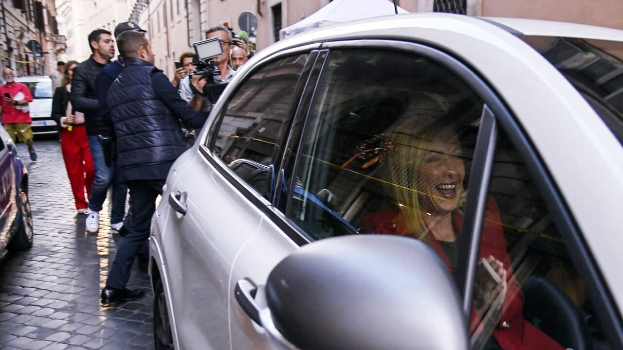 La leader di Fratelli d'Italia Giorgia Meloni lascia la sede del suo partito a Roma.