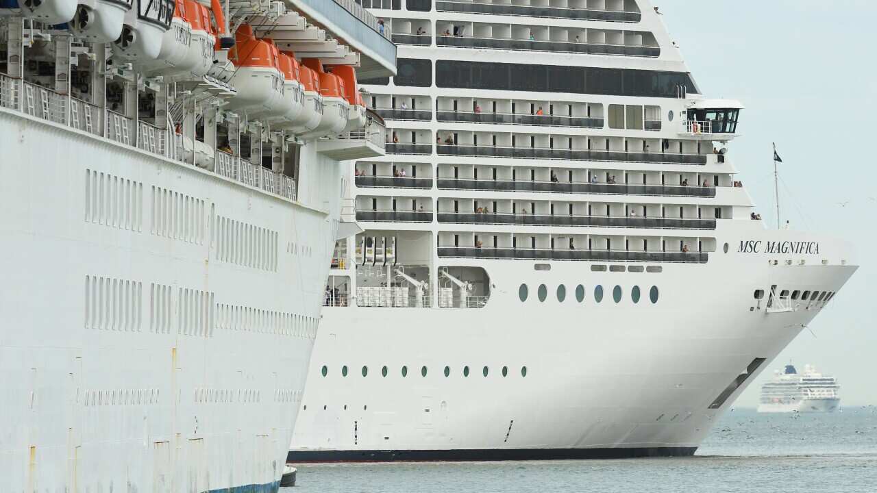 The MSC Magnifica cruise ship (right) is seen docked alongside the Golden Princess cruise ship at Station Pier in Melbourne, Thursday, March 19, 2020