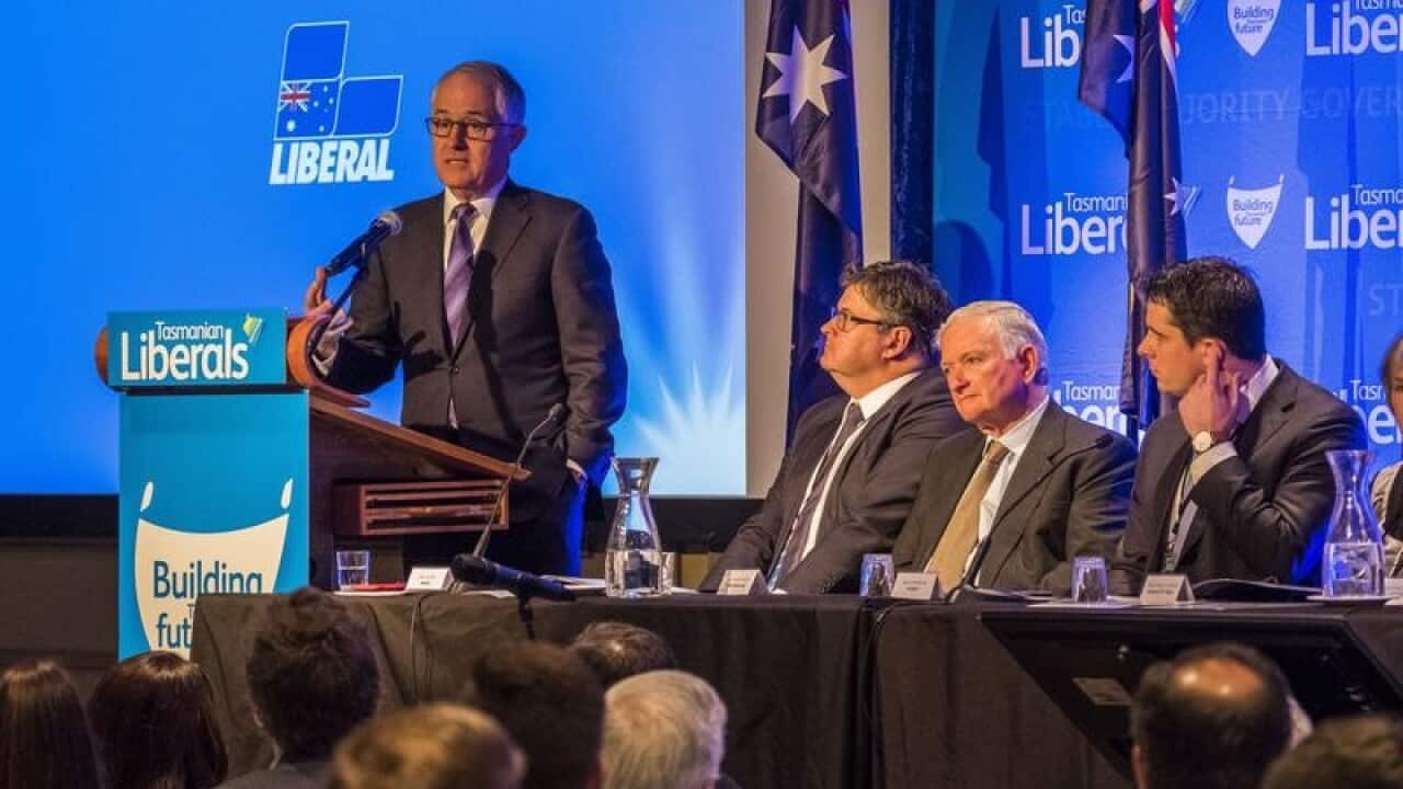 Australian Prime Minister Malcolm Turnbull (L)