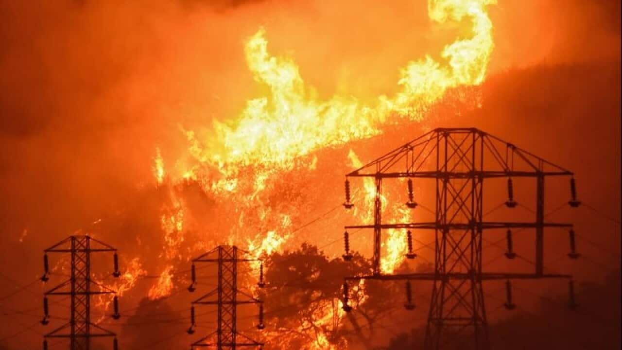 Fires burn on the hillside above the wealthy enclave of Montecito