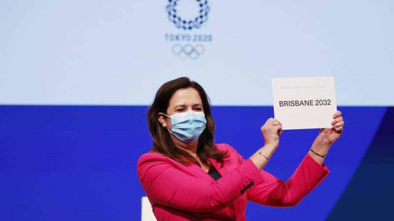 The Honourable Annastacia Palaszczuk MP, celebrates after Brisbane was announced as the 2032 Summer Olympics host city during the IOC Session at Hotel Okura in Tokyo, Wednesday, July 21, 2021.