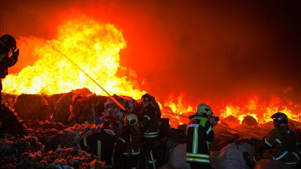 Firefighters fighting a fire.