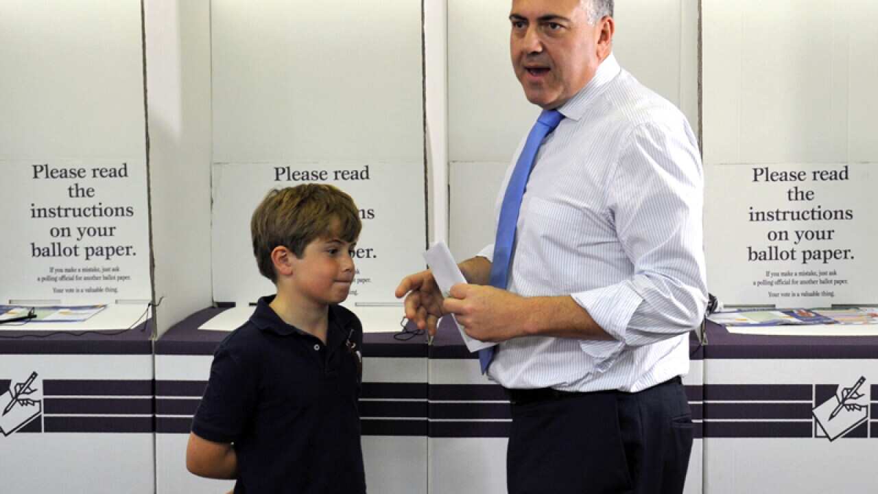 Shadow treasurer Joe Hockey casts his vote at Lane Cove Public School