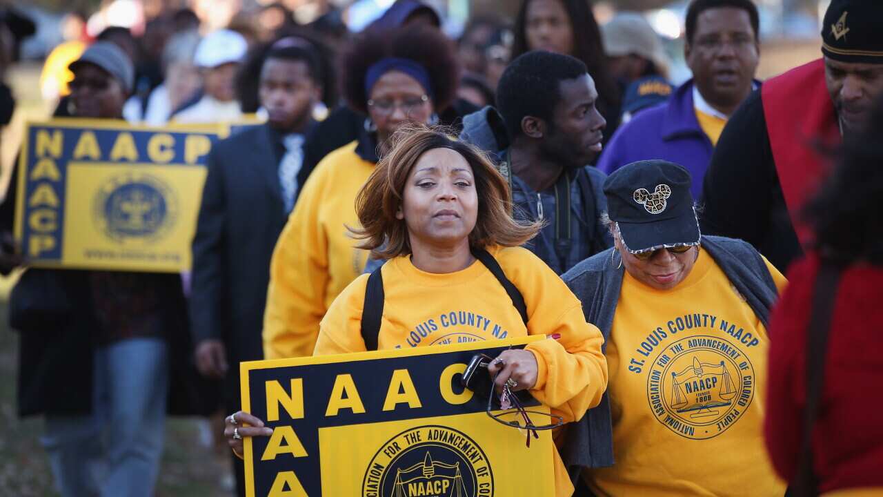 Members of the NAACP and their supporters at the Michael Brown memorial on November 29, 2014 in Ferguson, Missouri. (Scott Olson/Getty)