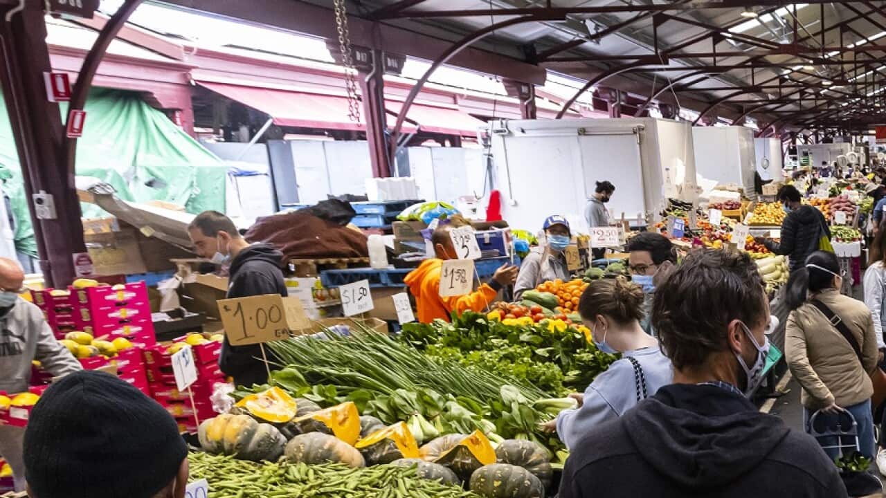 Customers are seen at the Queen Victoria Market in Melbourne