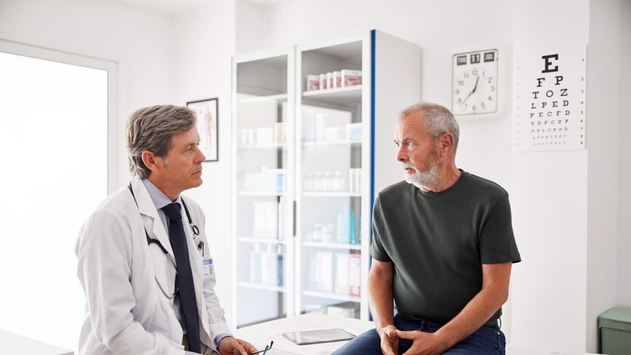 Doctor and patient talking with each other