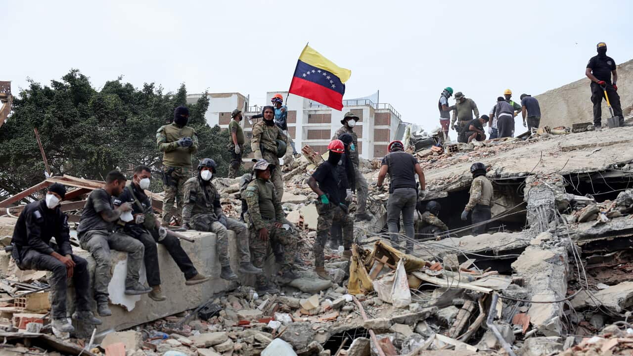 Lo sforzo dei soccorritori tra le macerie di La Guaira a Caracas.