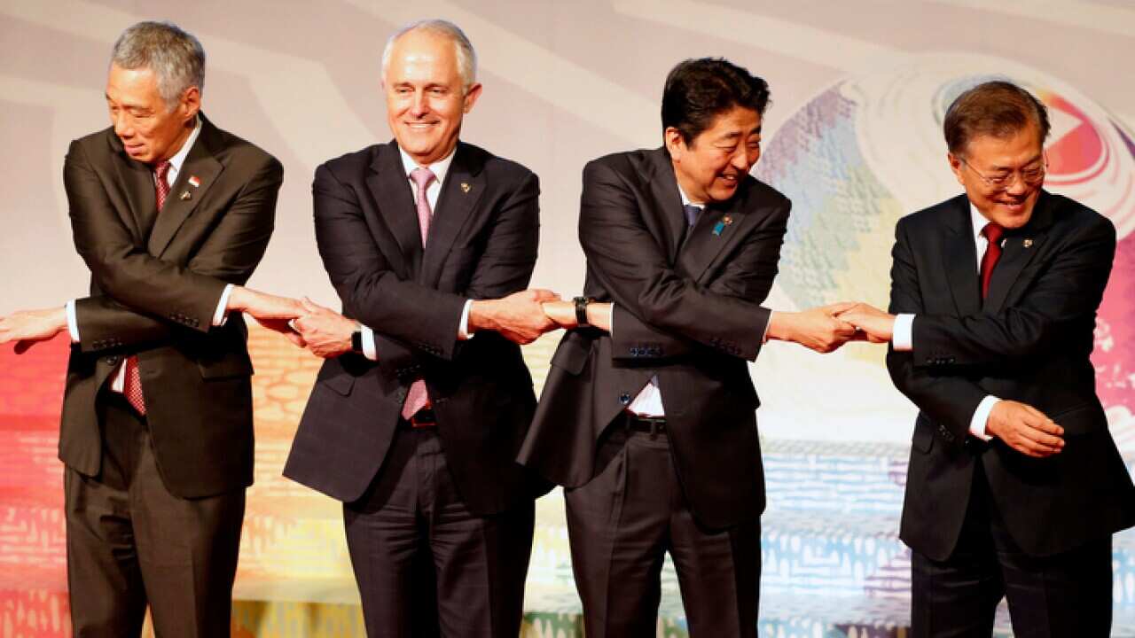 Australia Prime Minister Malcolm Turnbull, Japan Prime Minister Shinzo Abe.