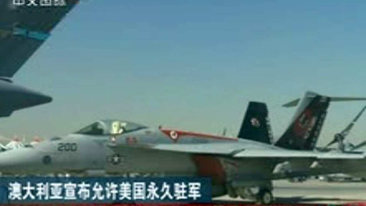 china_media_obama_visit_L_sbs_1991663204