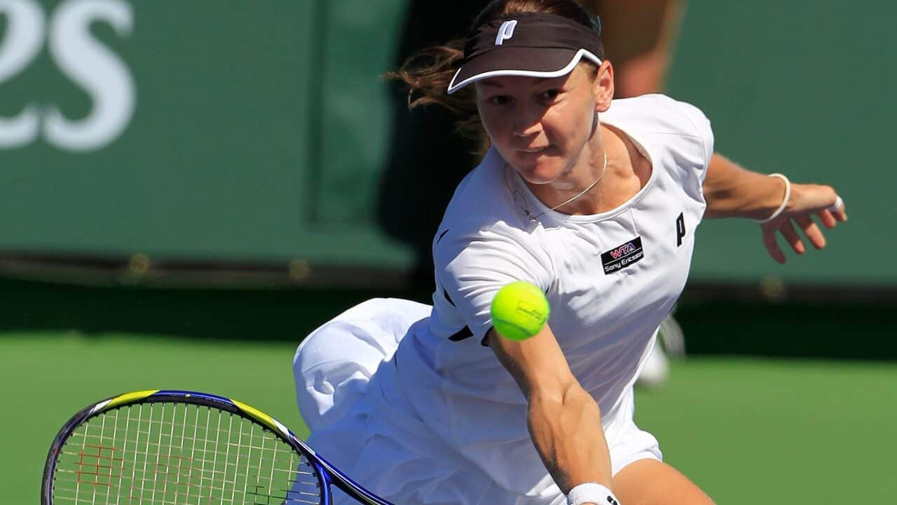 FILE - Renata Voracova of the Czech Republic returns a shot to Shuai Peng of China during a first round match at the BNP Paribas Open tennis tournament in Indian Wells, Calif., on March 10, 2011. The Australian Broadcasting Corp. reported later Friday, Ja