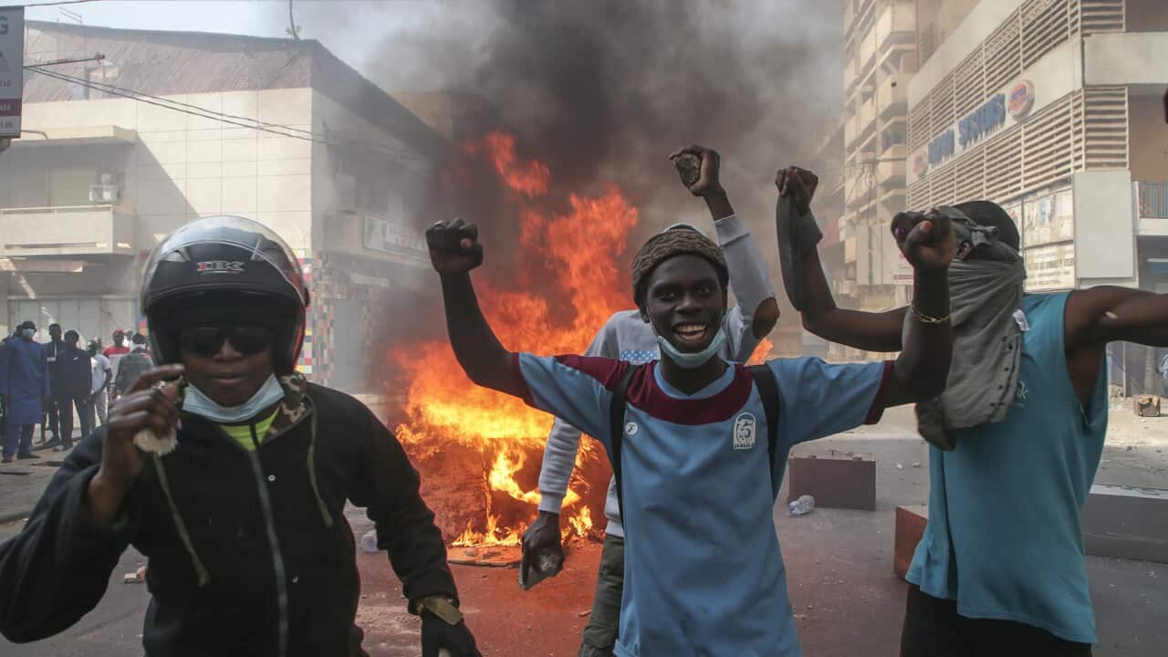 Opposition supporters of leader Ousmane Sonko clash with security forces during a protest in Dakar, Senegal 05 March 2021.