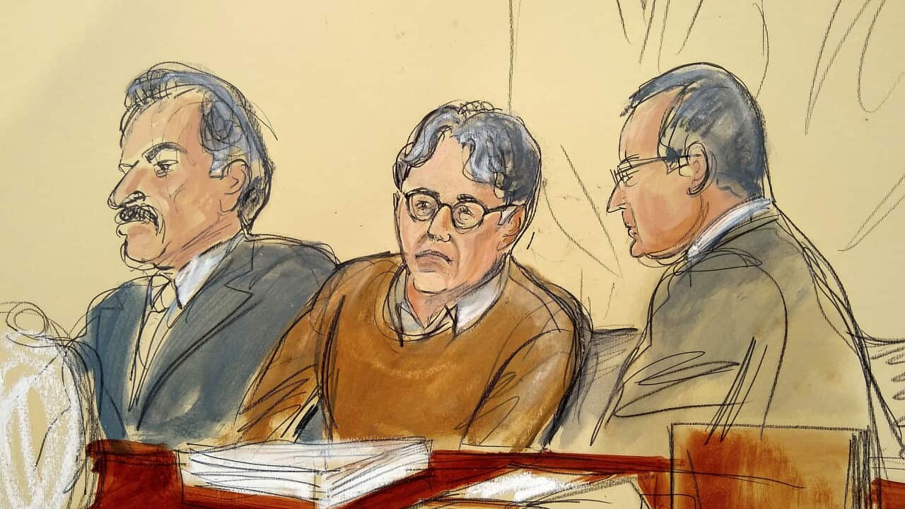 In this courtroom drawing, Keith Raniere, centre, is depicted during the first day of his sex trafficking trial, Tuesday, May 7, 2019.
