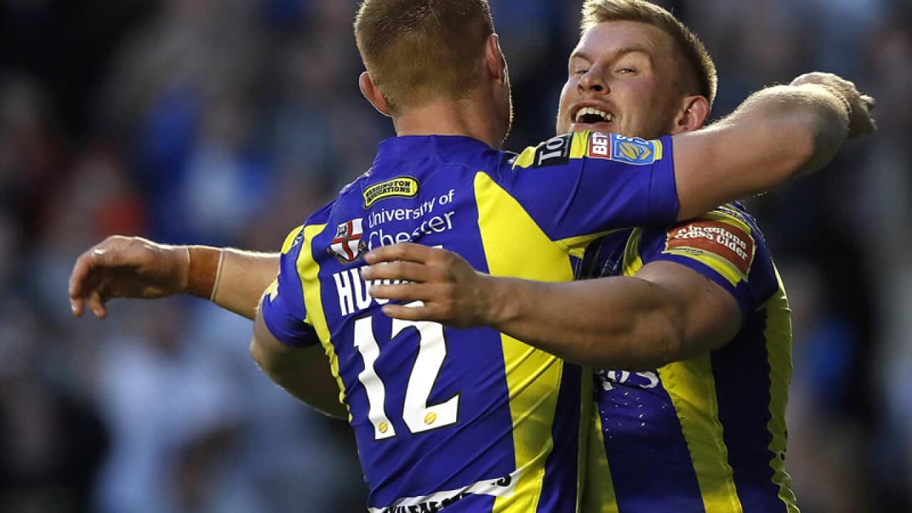 Warrington Wolves' Mike Cooper (R) celebrates his try
