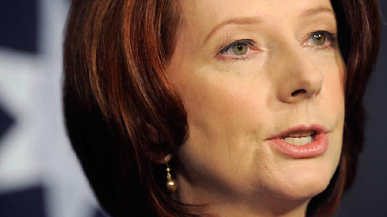 gillard_close_flag_101019_B_aap_2048455877