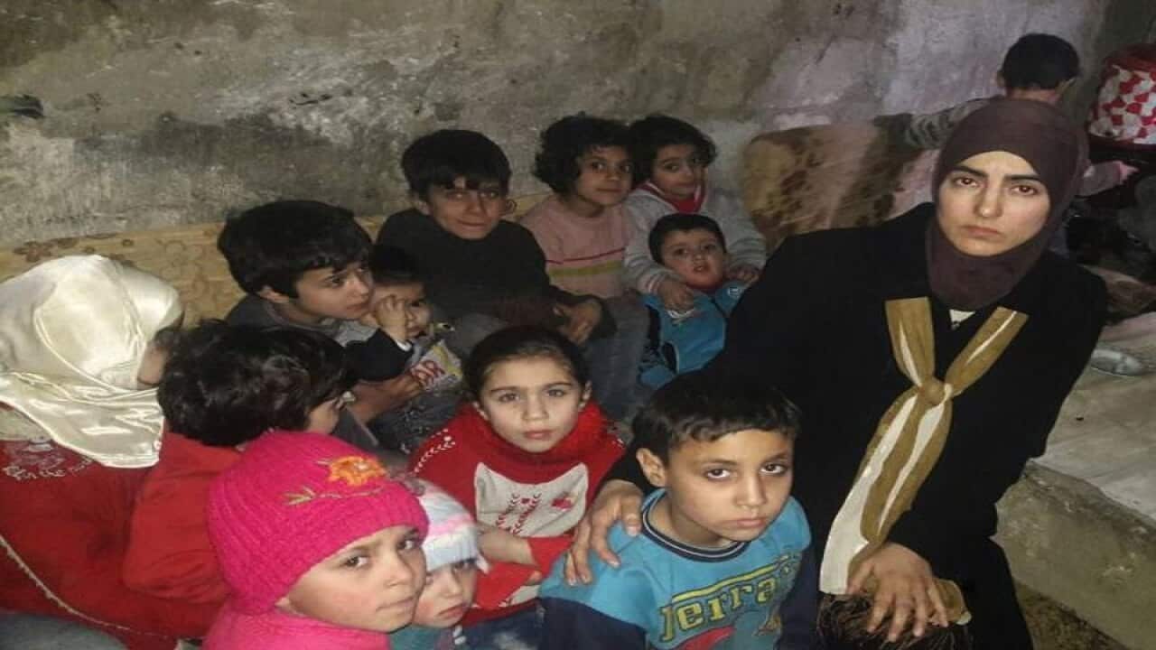 Women and children take shelter in Ghouta, Syria