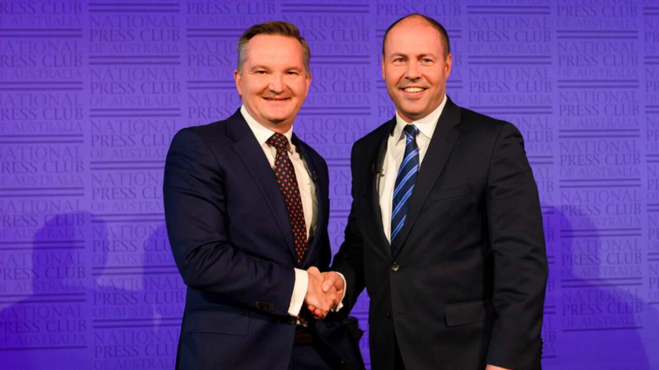 Treasurer Josh Frydenberg and Shadow Treasurer Chris Bowen shake hands prior to the treasurer's debate at the National Press Club, in Canberra, Monday, May 6, 2019. (AAP Image/Rohan Thomson) NO ARCHIVING