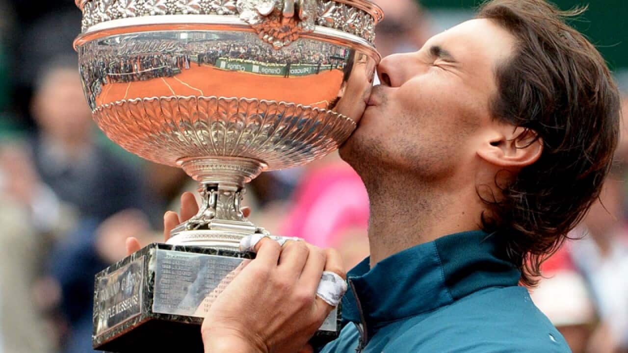 Rafael Nadal of Spain celebrates winning the French Open