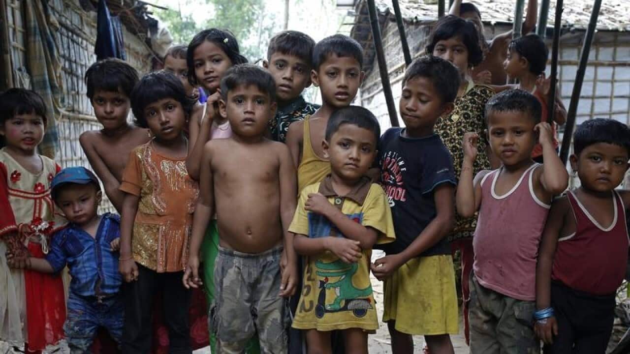 Rohingya children at a refugee camp in Bangladesh, one year after a brutal military crackdown forced them to flee Myanmar.