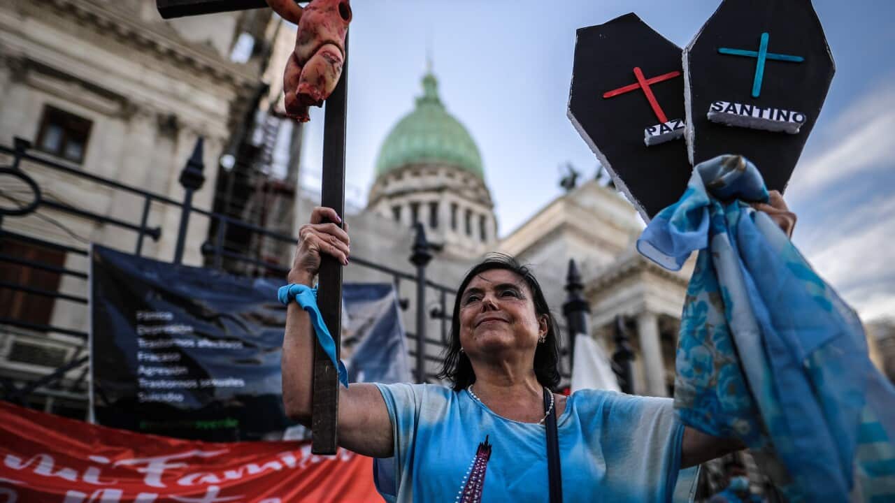 People participate in a demonstration against the Bill on Legal Abortion, in front of the National Congress, in Buenos Aires, Argentina.