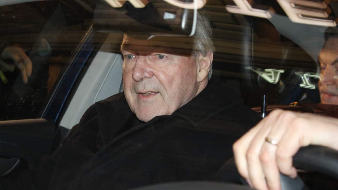 Cardinal George Pell leaves the Quirinale Hotel