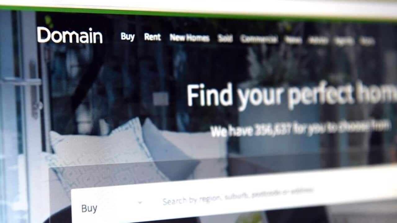 A file image of the Domain homepage on a laptop in Sydney.